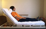 正しい在保持姿勢　布団を使用した座位保持の方法